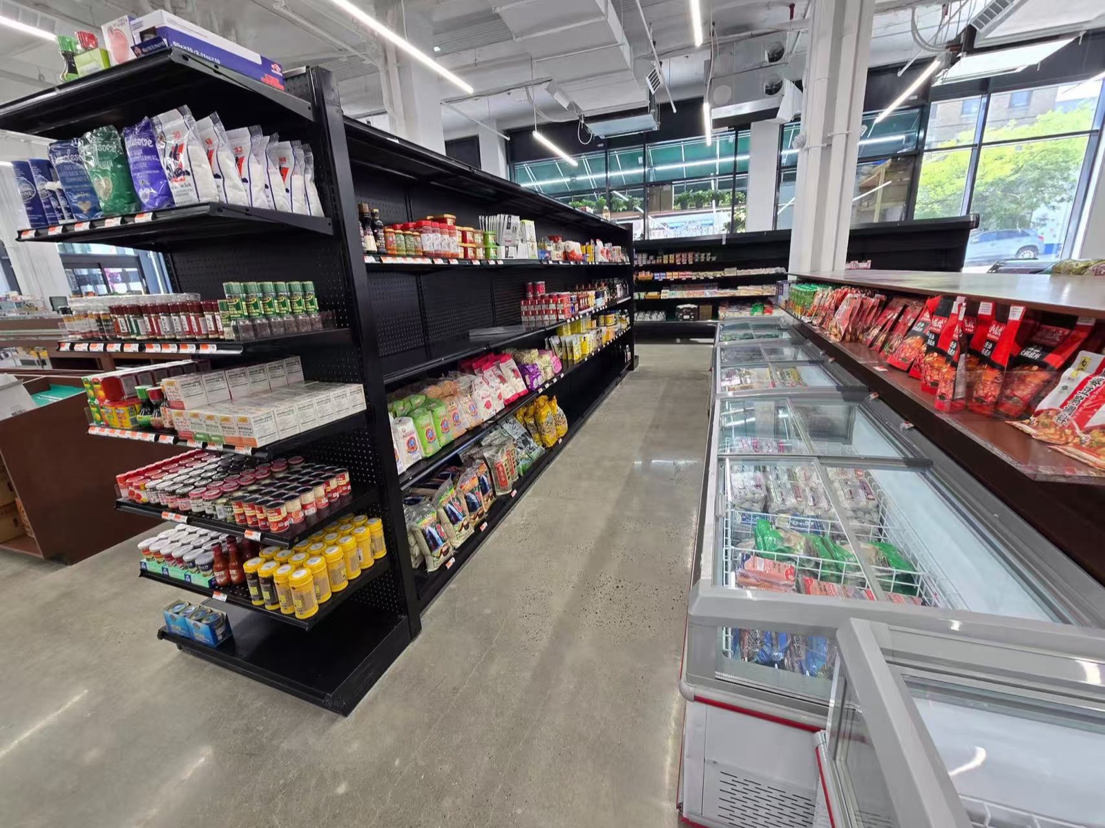 Shelves and freezer cases stocked inside SMART LIC
