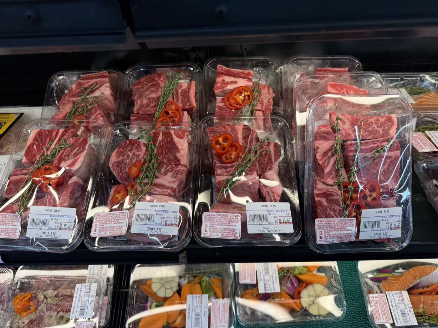 Fresh short ribs packed with herbs and peppers at SMART LIC